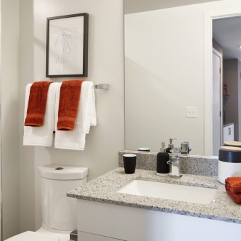 Relaxing baths with luxurious rectangular sink vanities.