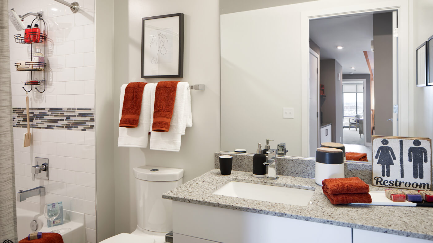 Relaxing baths with luxurious rectangular sink vanities.